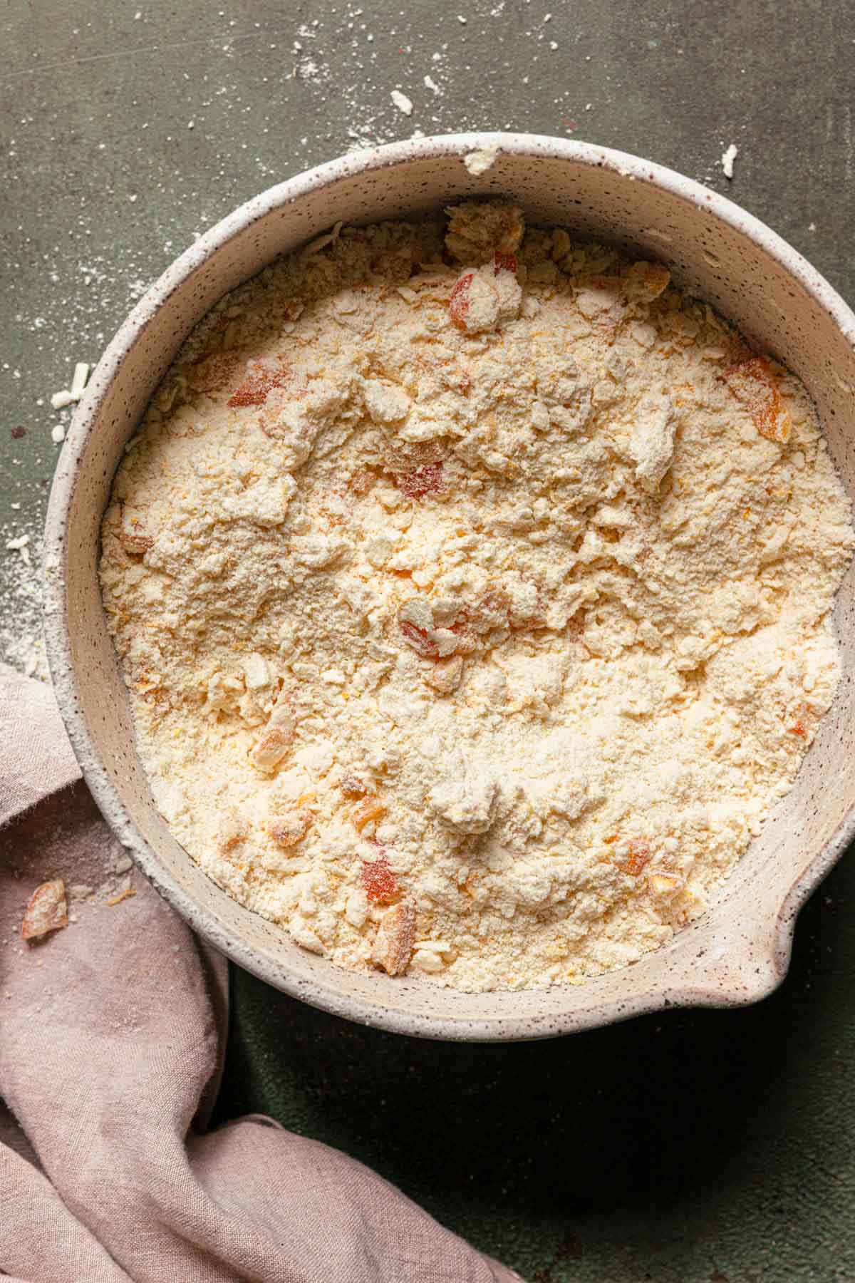 A bowl with flour mixed with butter.
