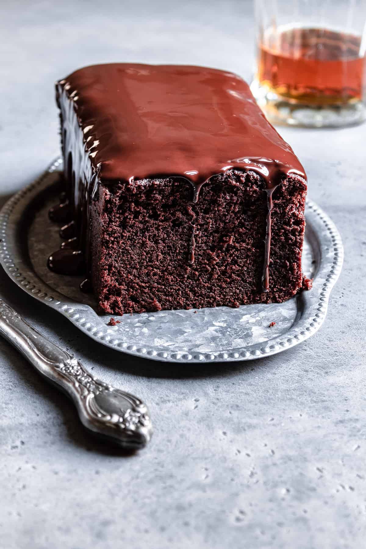 sliced chocolate gin cake with chocolate drizzle