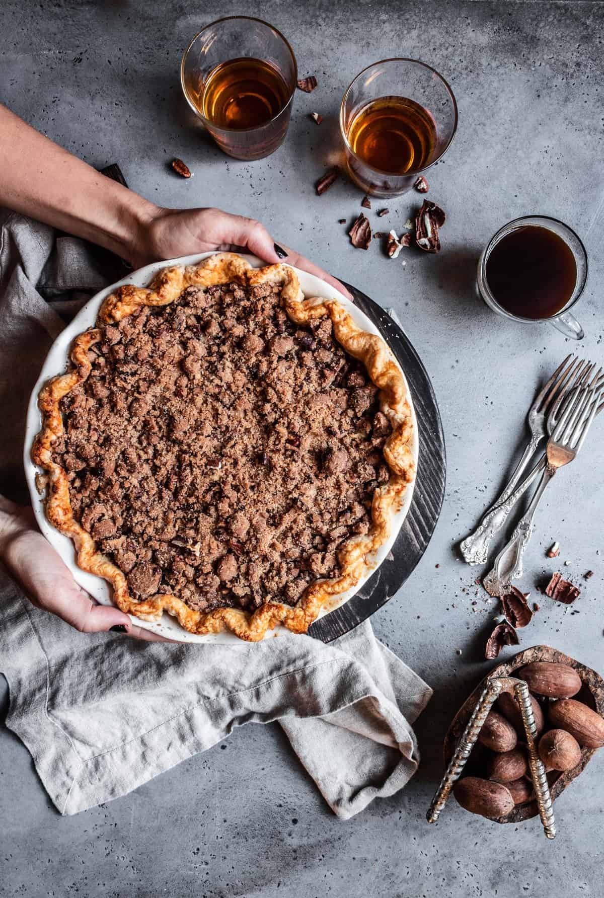 Pear pie with pecan cinnamon streusel topped with Tillamook ice cream.