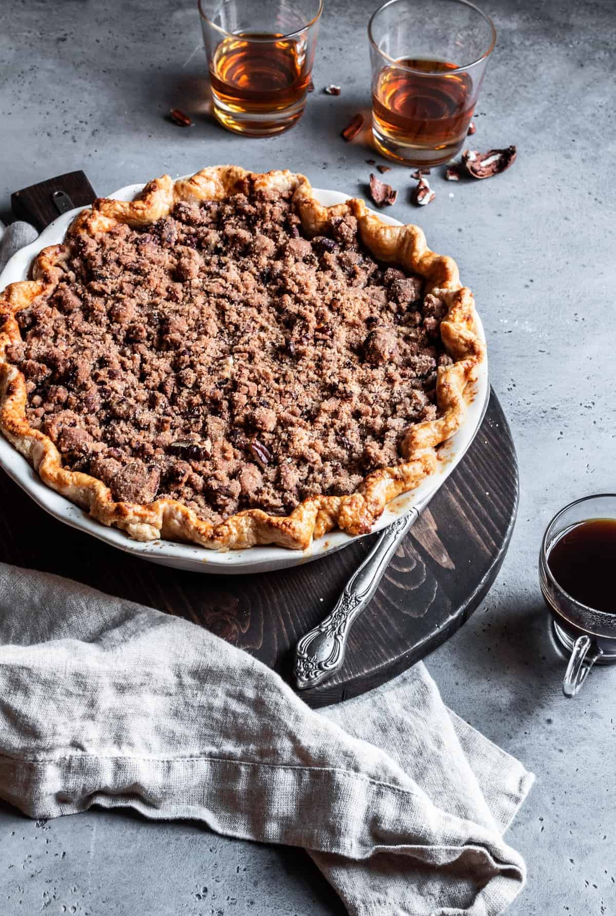 Pear pie with pecan cinnamon streusel topped with Tillamook ice cream.