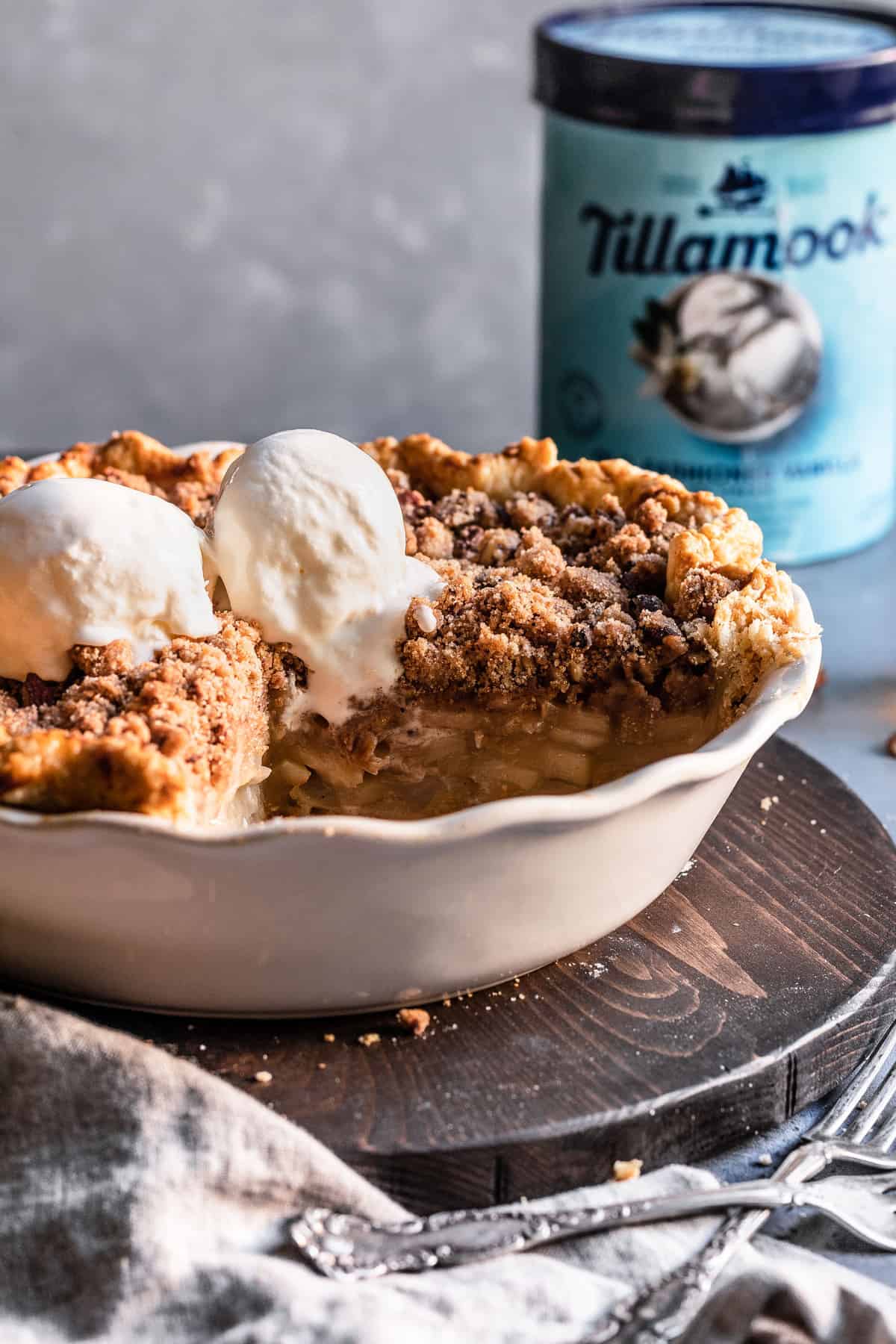 Pear pie with pecan cinnamon streusel topped with Tillamook ice cream.