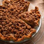 Pear pie topped with cinnamon pecan streusel.