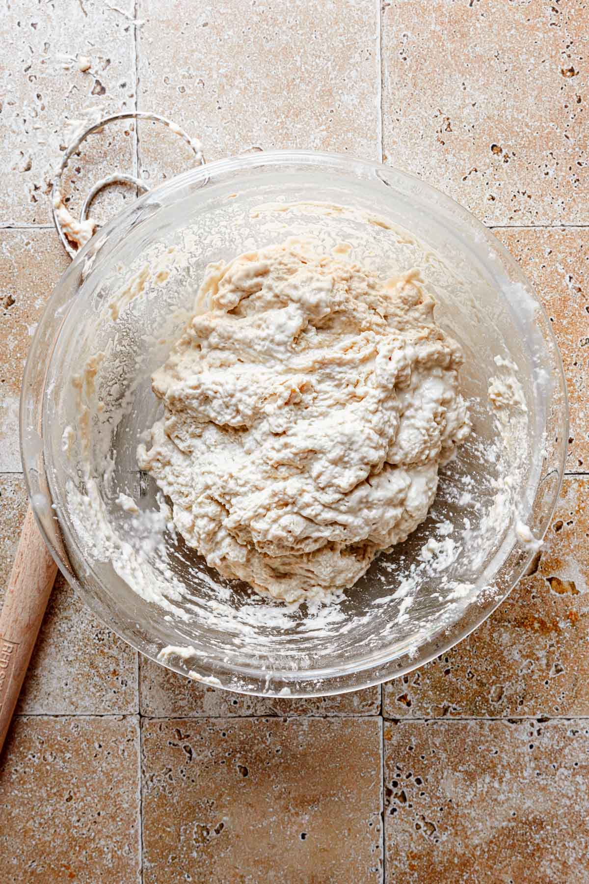 A bowl with shaggy dough.
