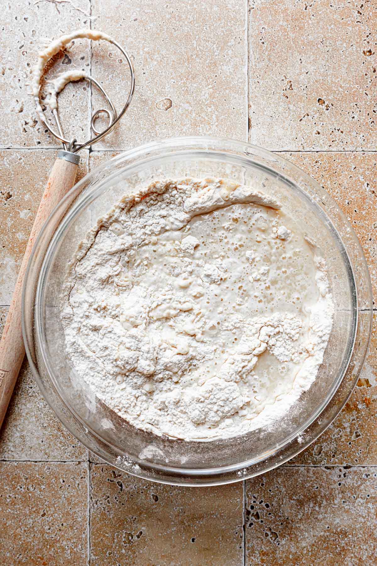 A bowl with flour mixture and water. 