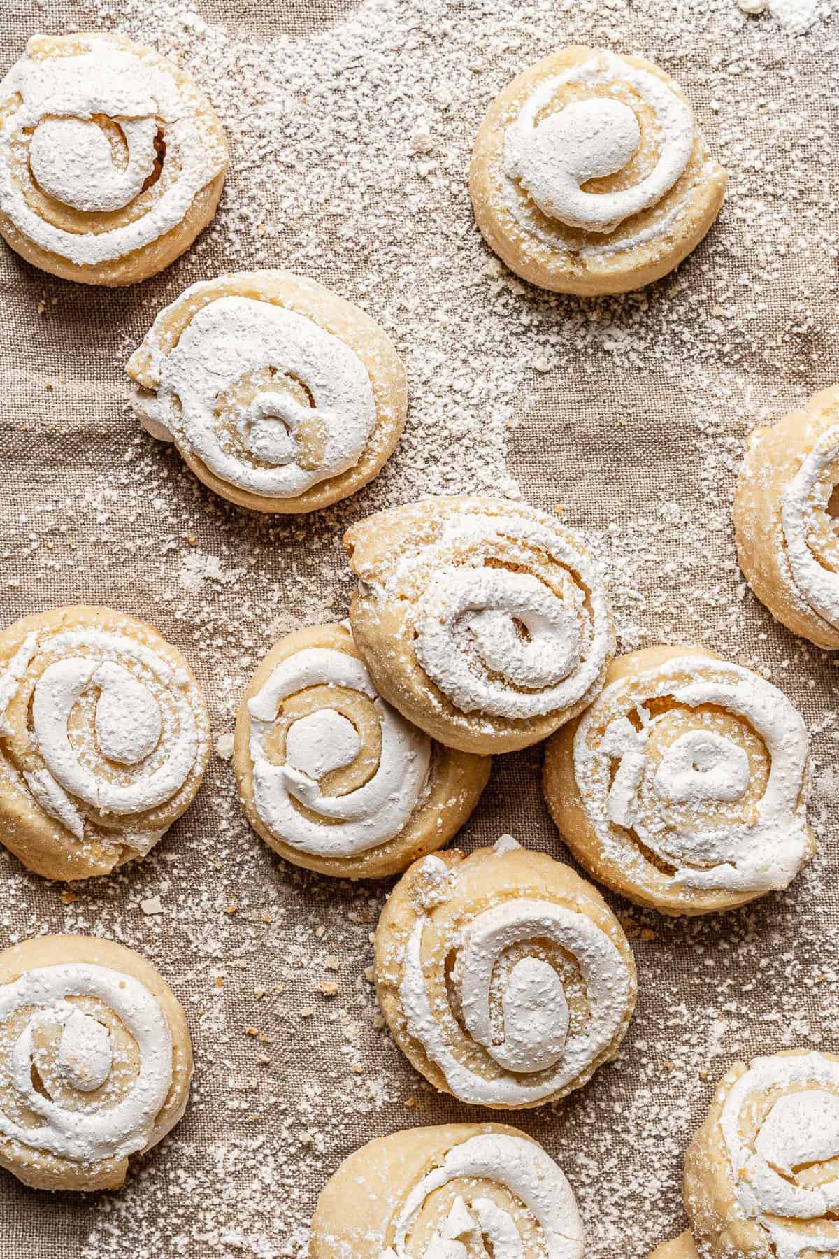  meringue filled cookies dusted with powdered sugar