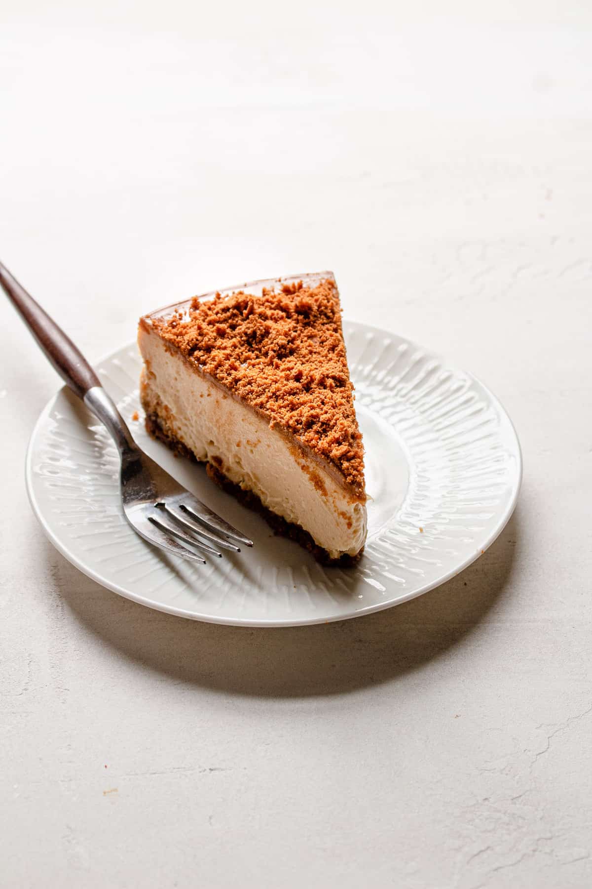 A slice of cookie butter cheesecake