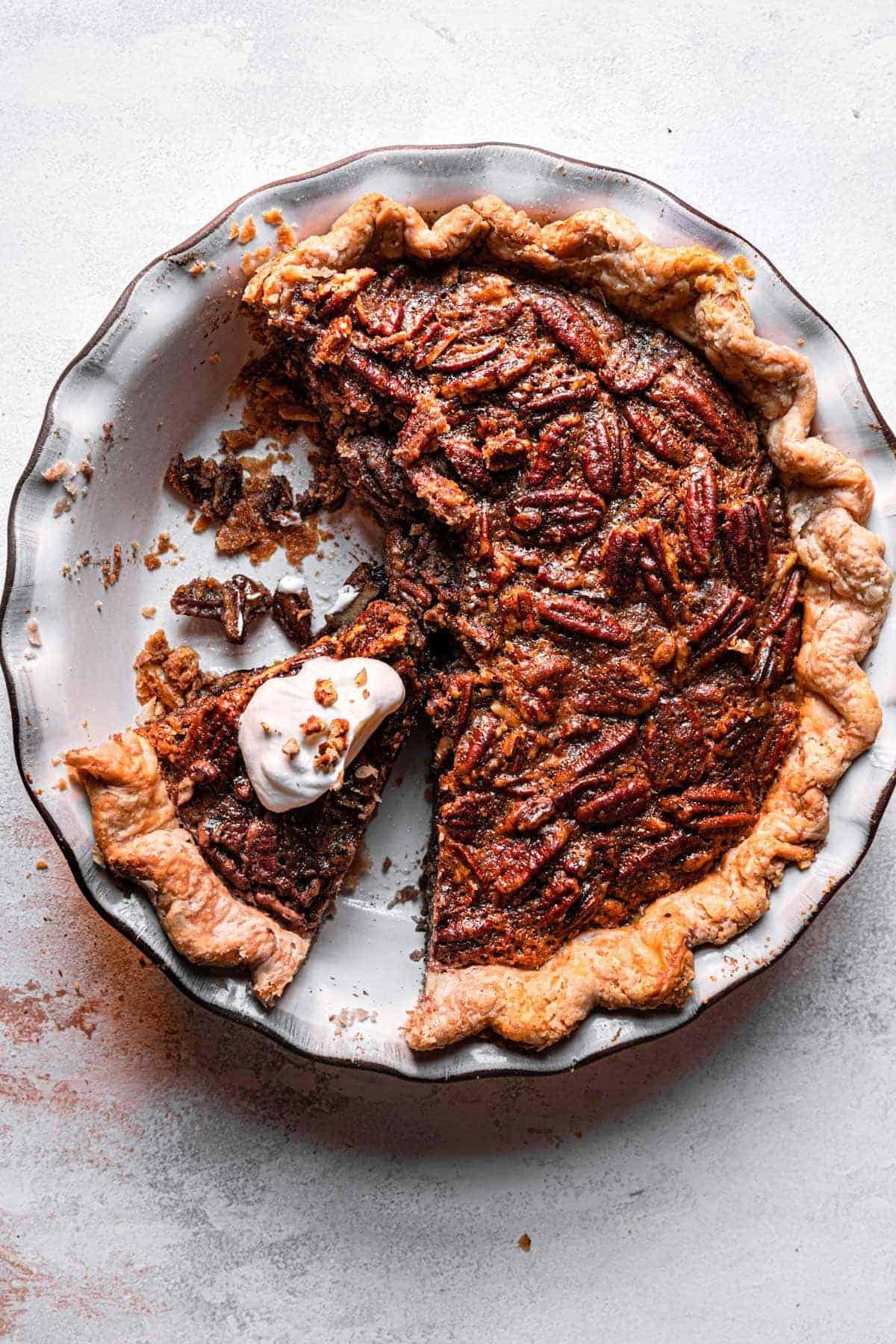 sliced pie topped with whipped cream