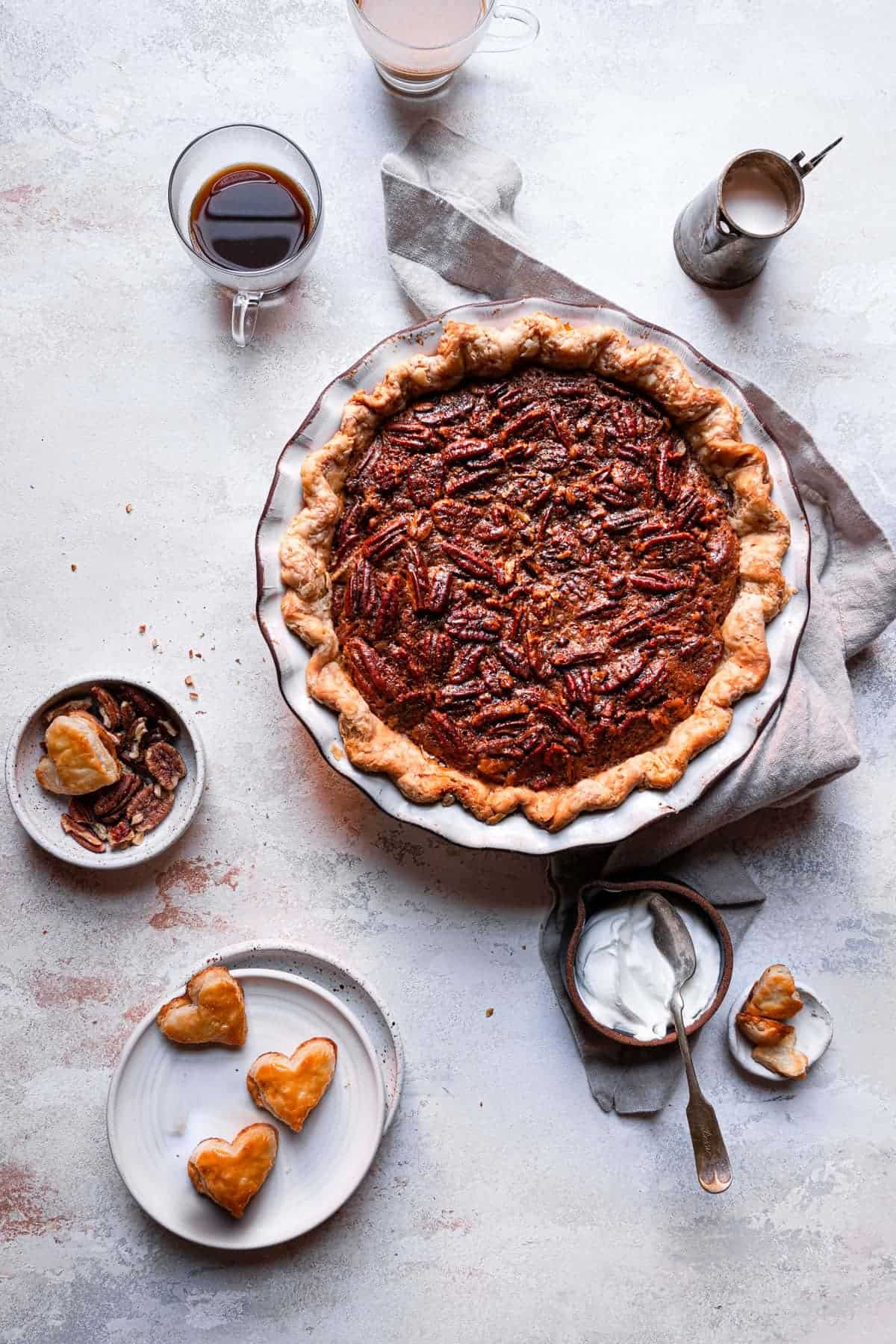 pie with pecans in a pie pan