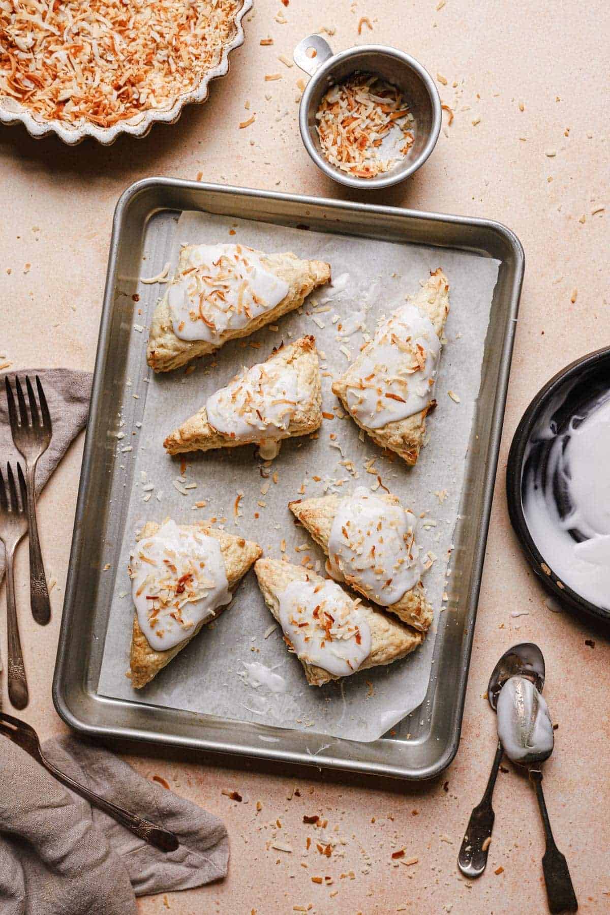 frosted scones in a pan 