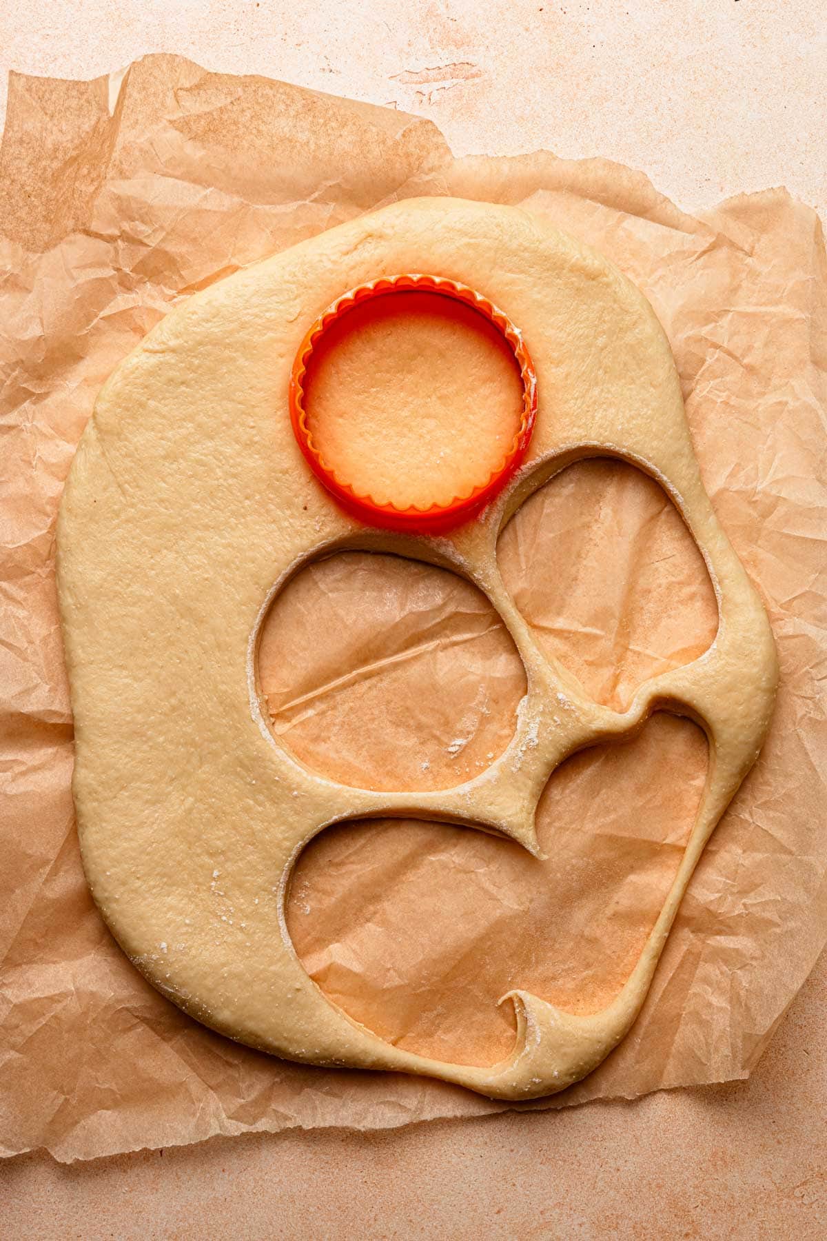 Roll dough cut using a cookie cutter.