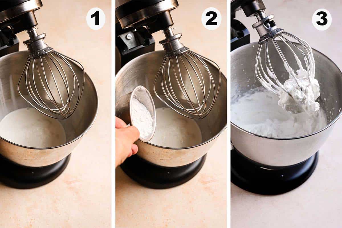 A stand mixer fitted with the whisk attachment. Bowl with heavy cream. Hand adding stabilizer. Whisk full of airy cream.