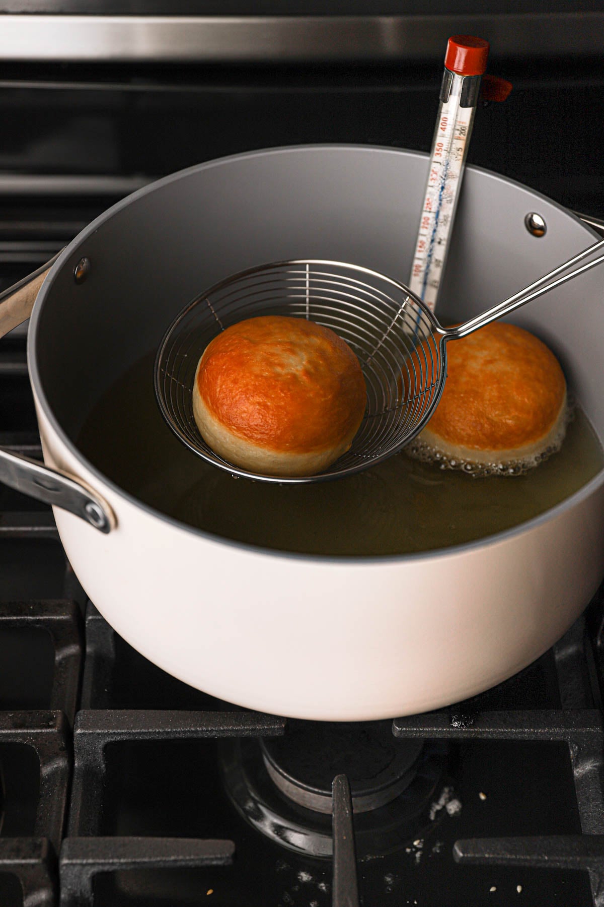 Frying donuts.