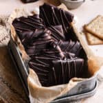 Chocolate covered graham crackers in a container