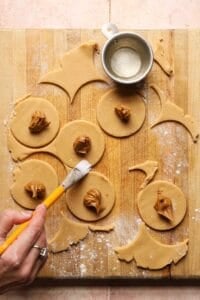 shaping hamentashen cookies