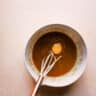 Melted butter sugar and egg in a bowl