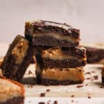 Blondie and brownie dessert bars stack one on top of the other