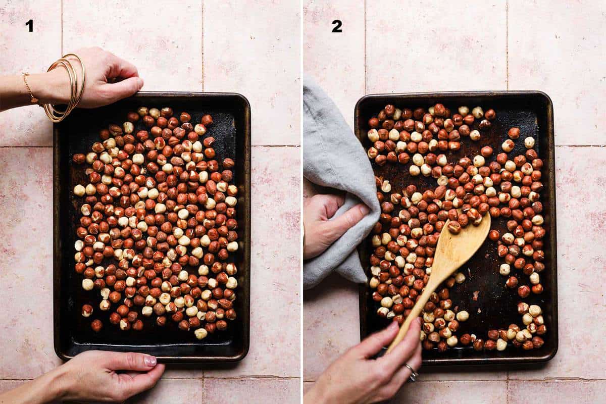 Hands holding a baking sheet full of nuts.