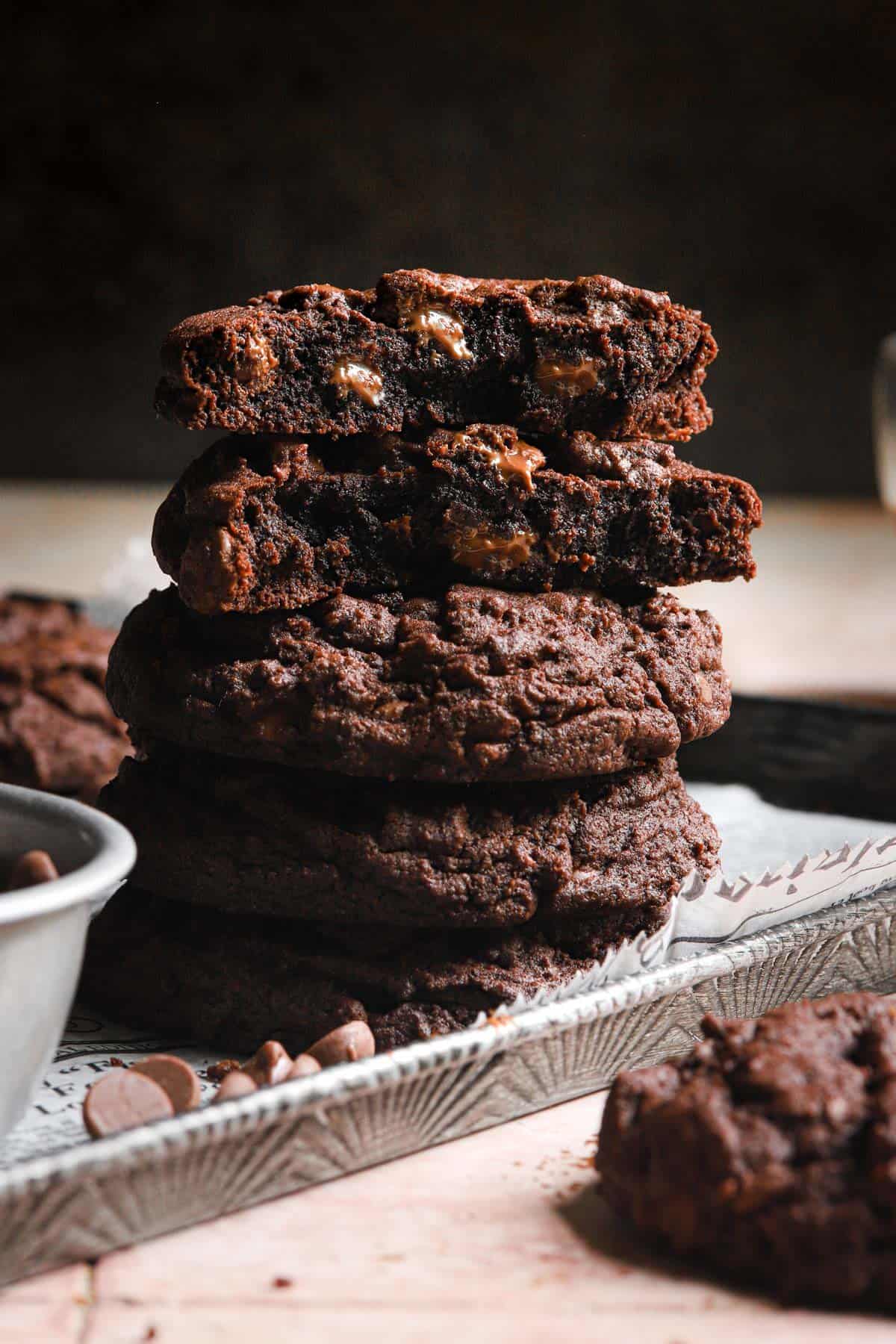 Chocolate cookies in a pile.