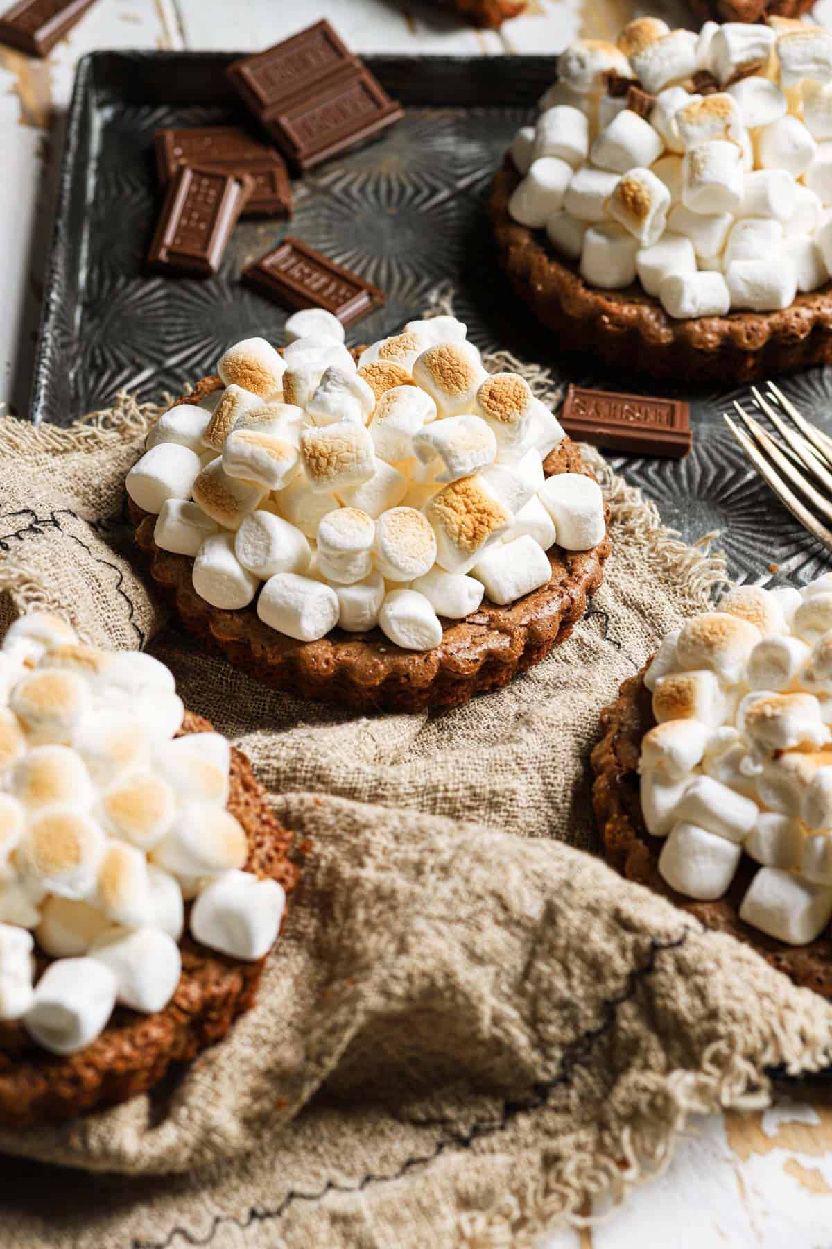 A brownie pie topped with marshmallows.