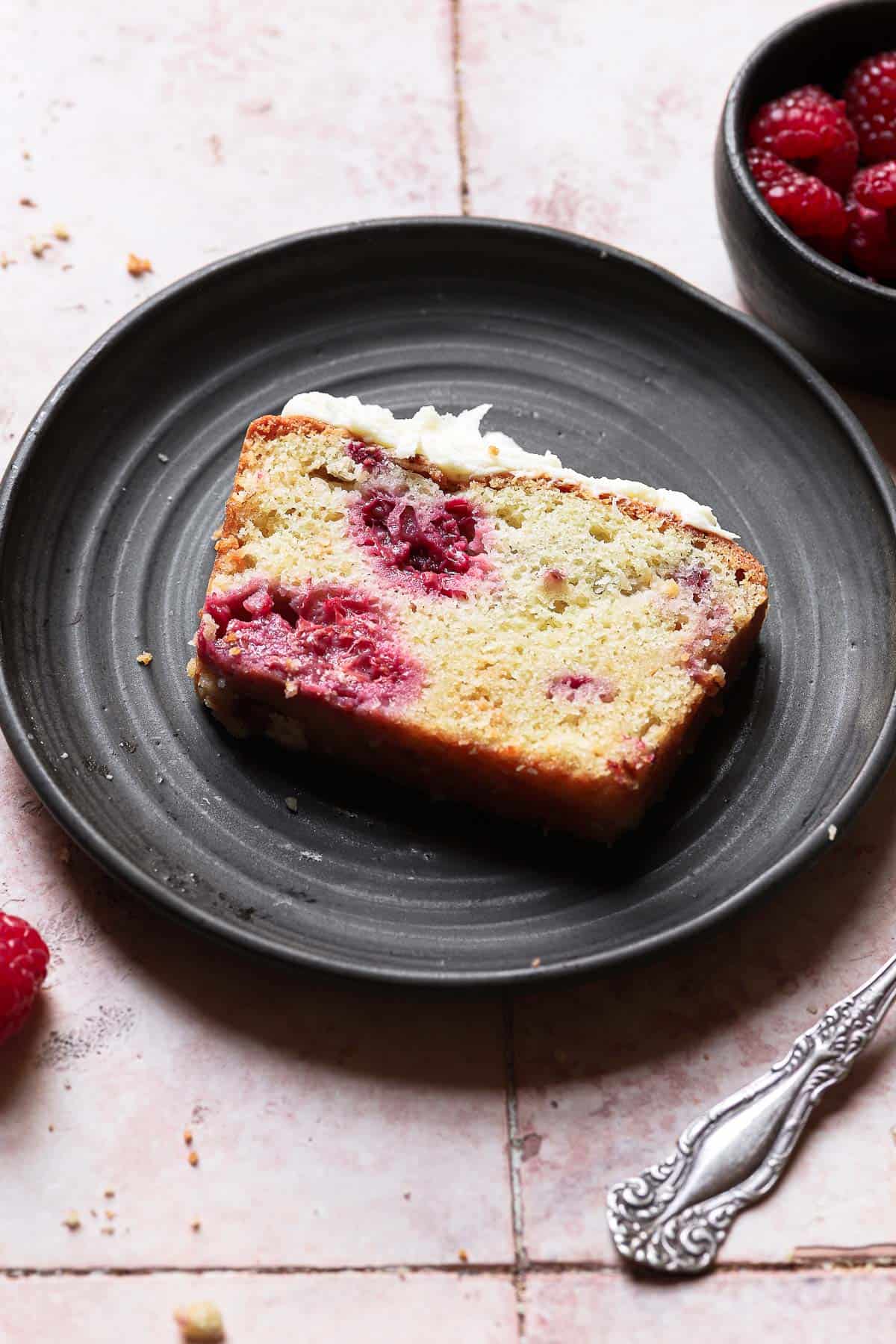 A slice of raspberry loaf cake 