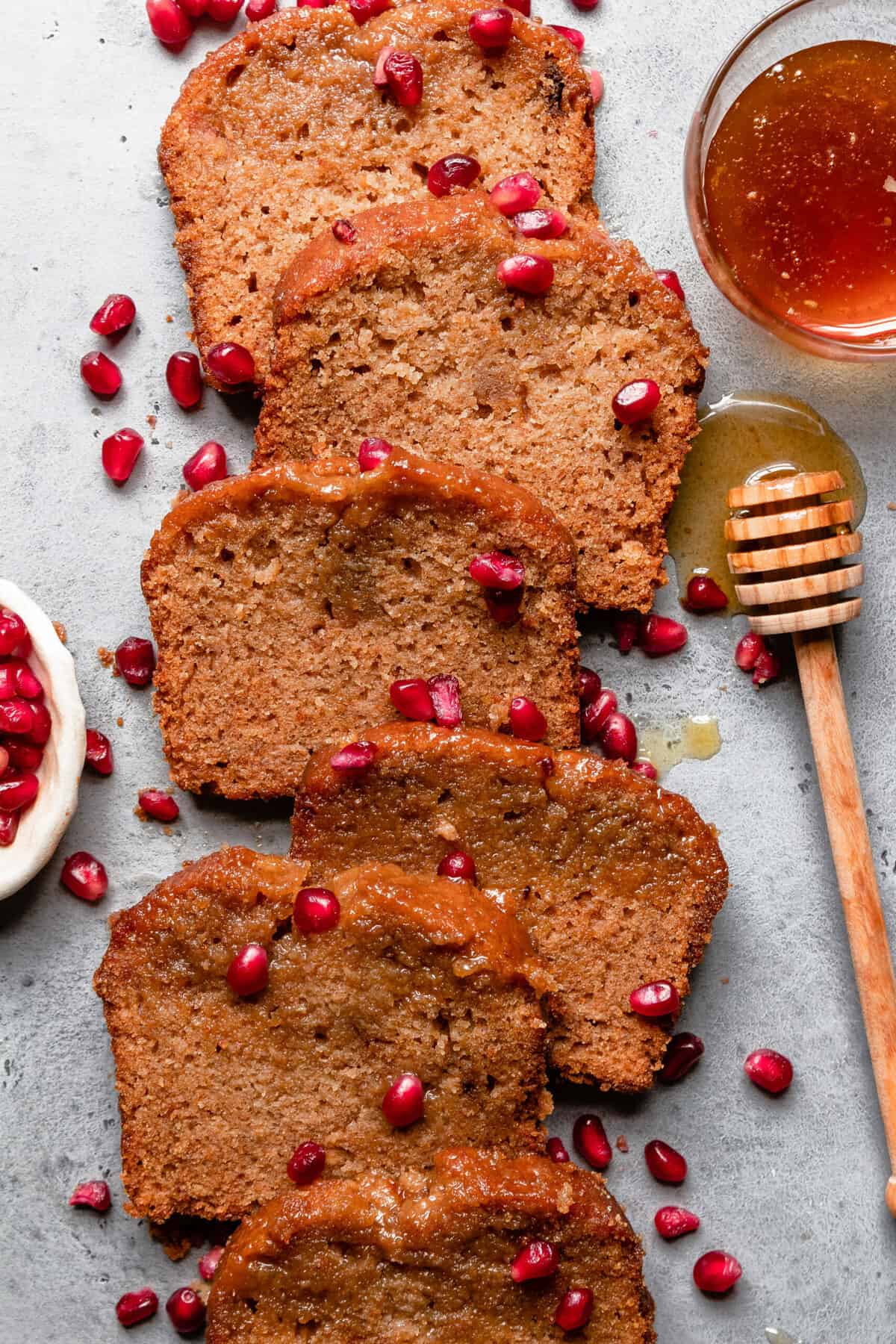 sliced cake sprinkled with pomegranate seeds