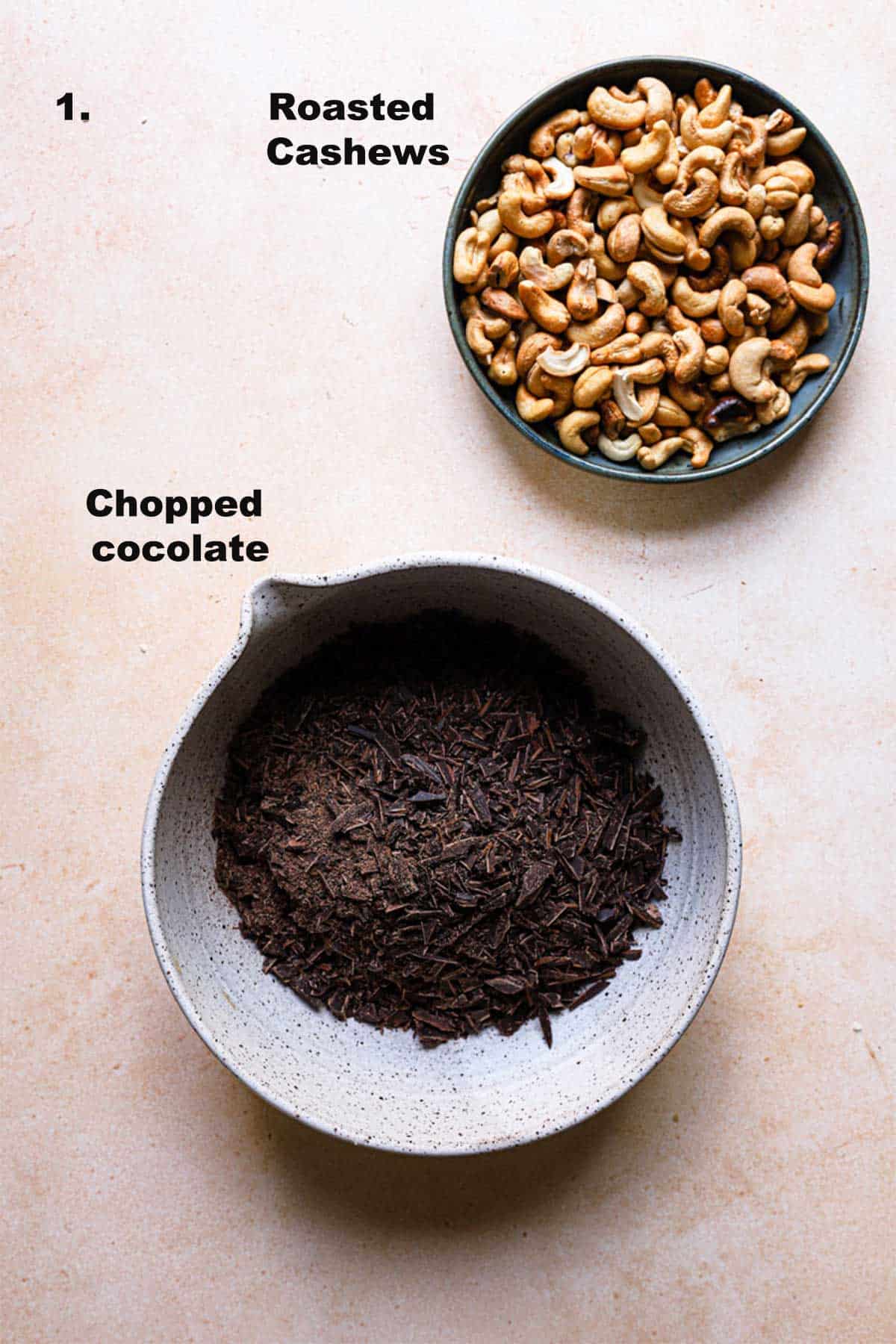 Roasted cashews and chopped chocolate in bowls