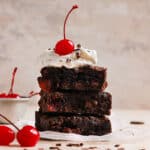 Brownies and cherries in a stack