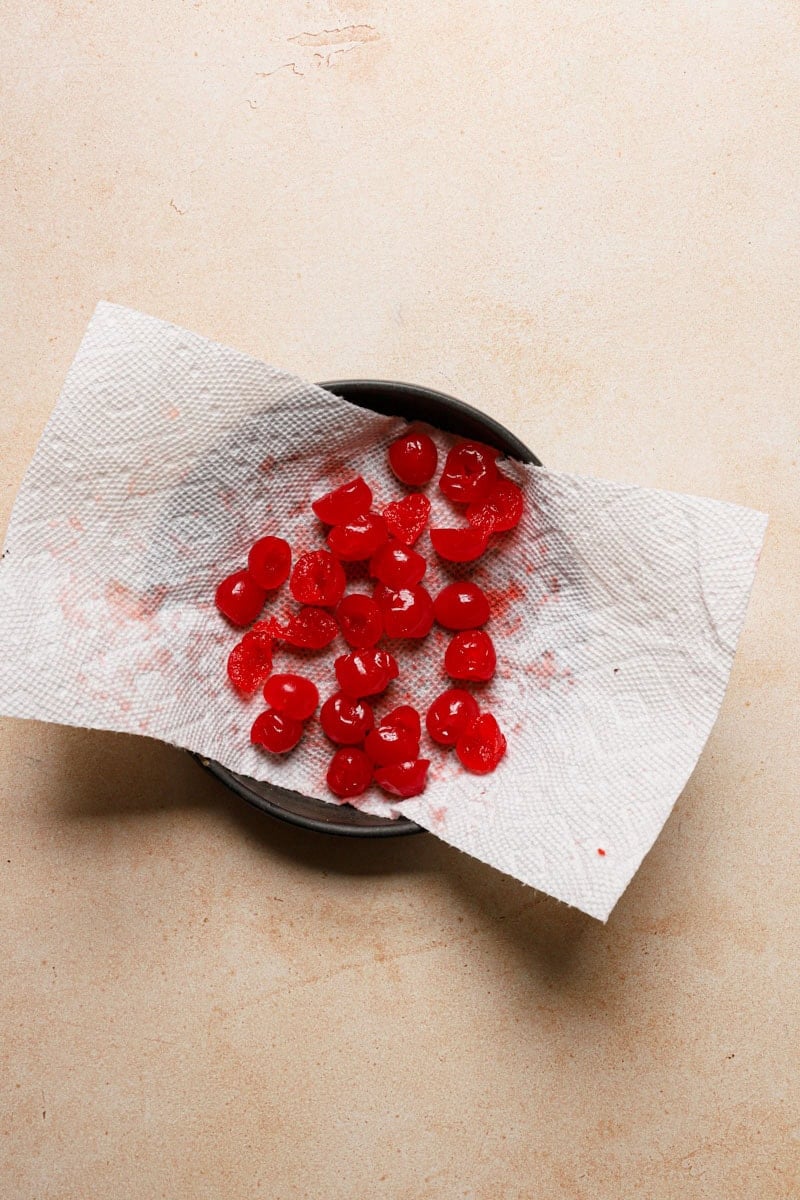 Maraschinos cherries over paper towel.