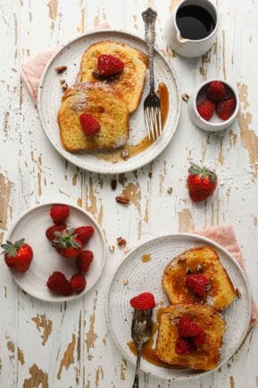 French toast in plates with berries