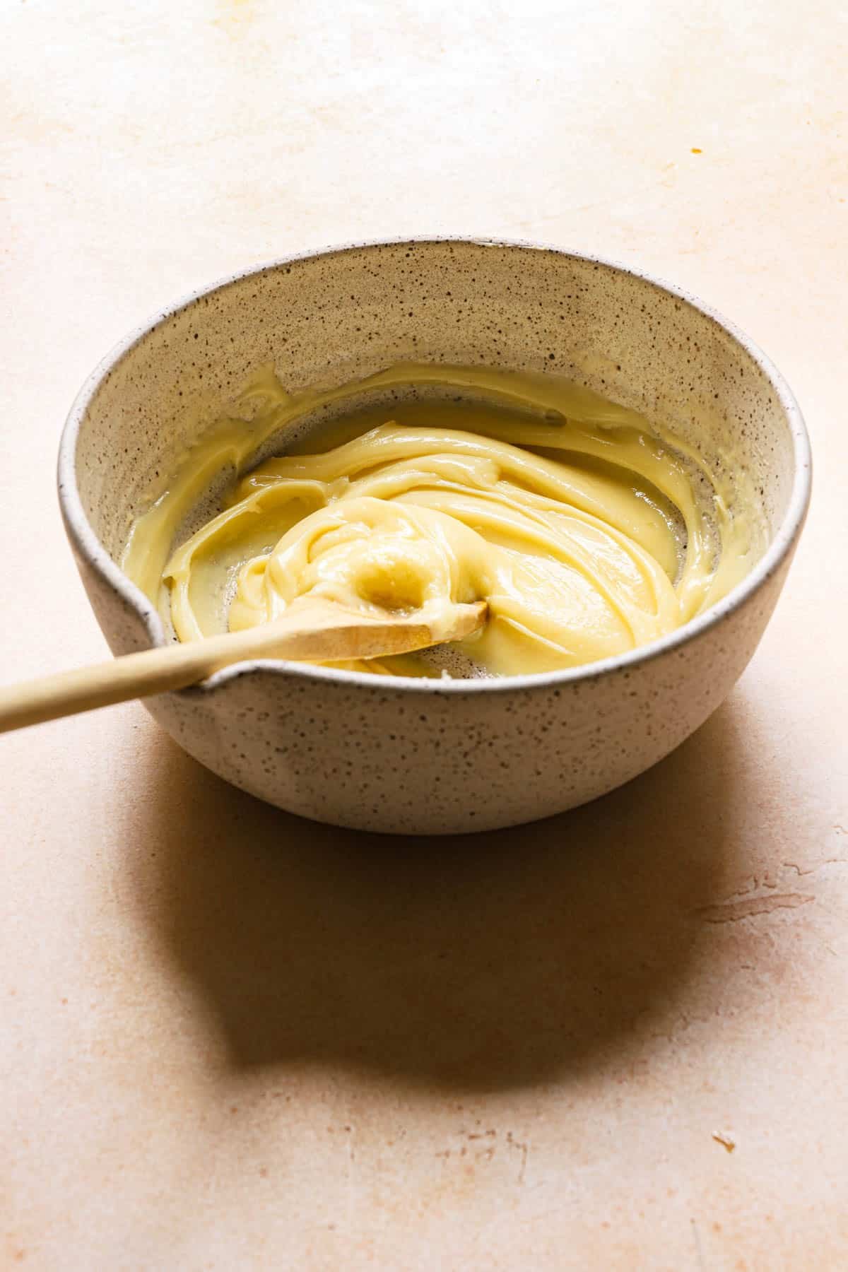 white chocolate ganache in a bowl