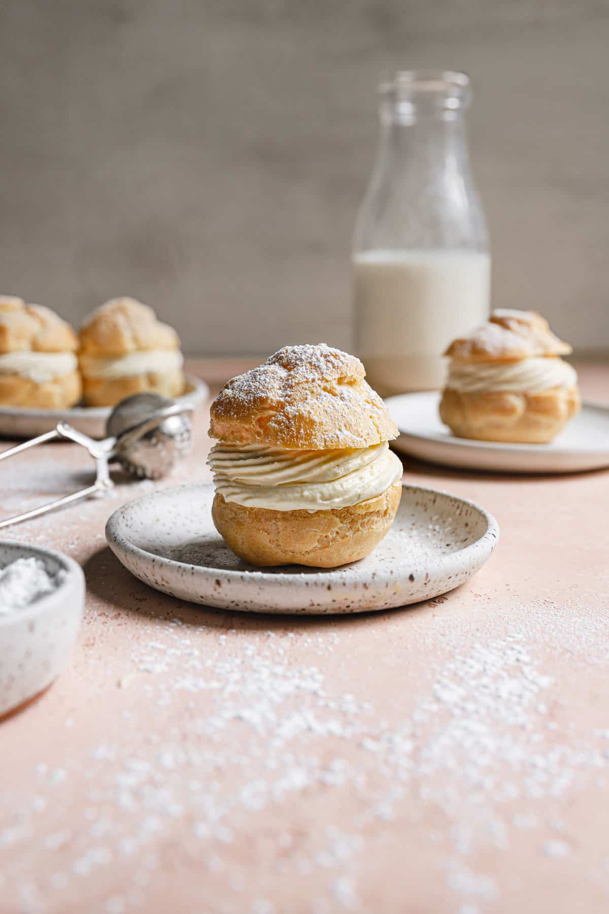 filled choux pastries in plates