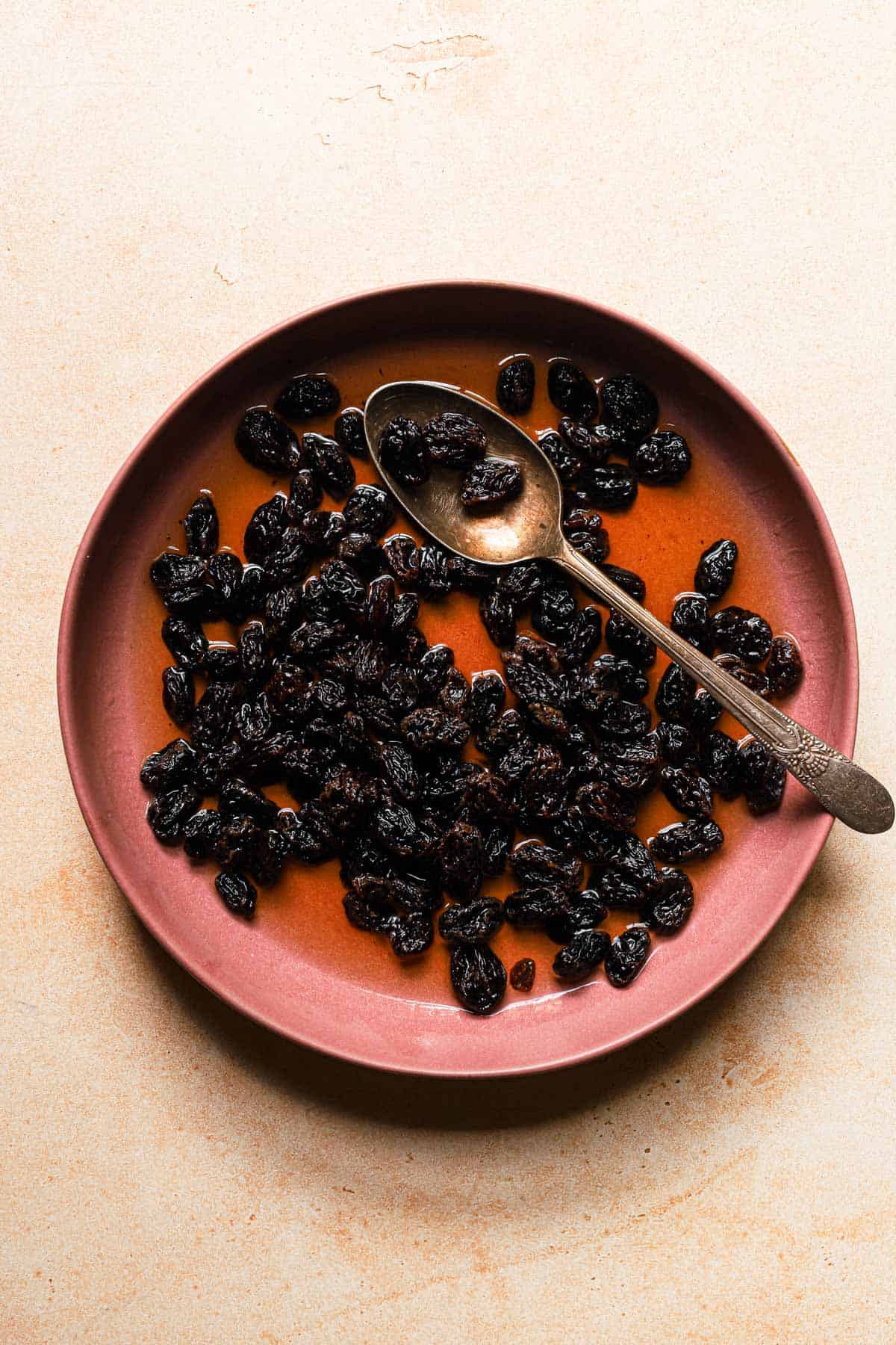 raisins in a bowl with rum