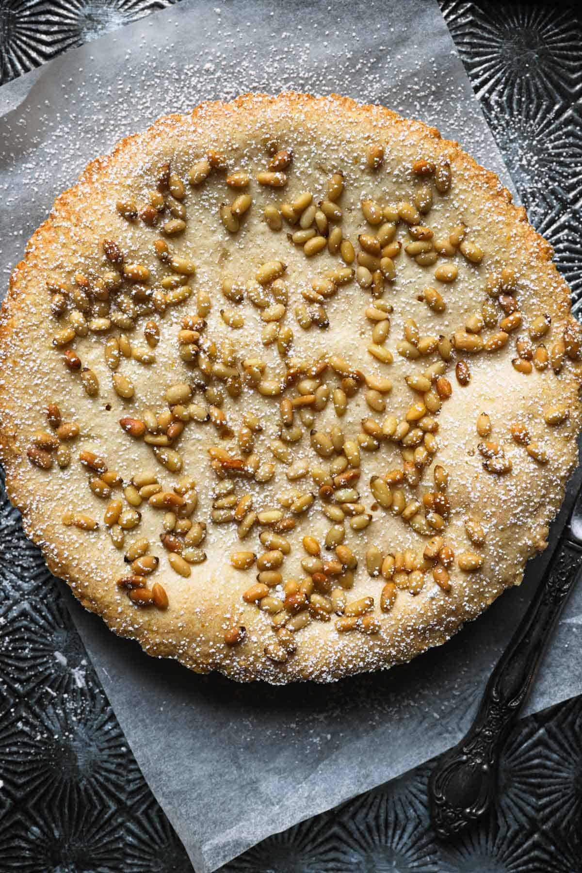 italian tart topped with pine nuts 