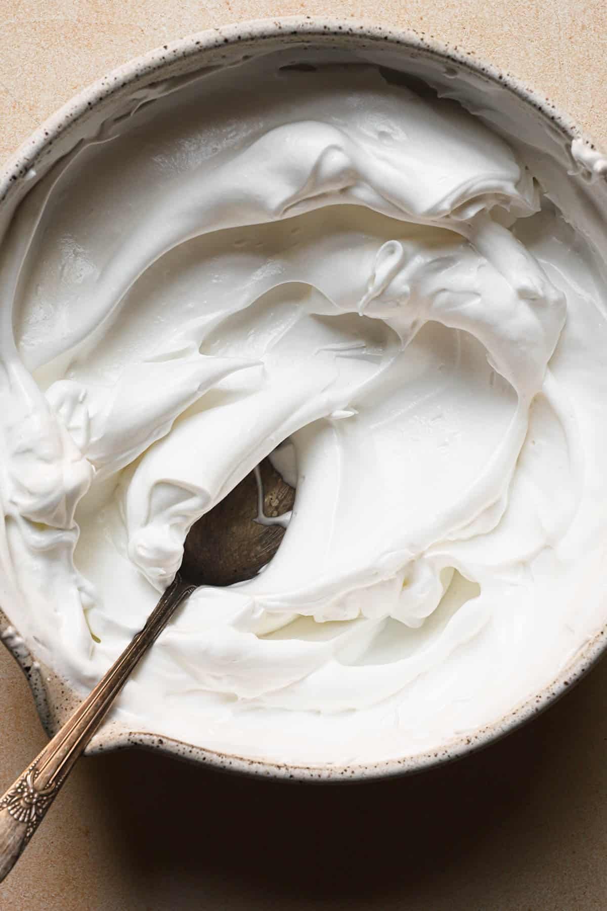 meringue in a bowl with a spoon