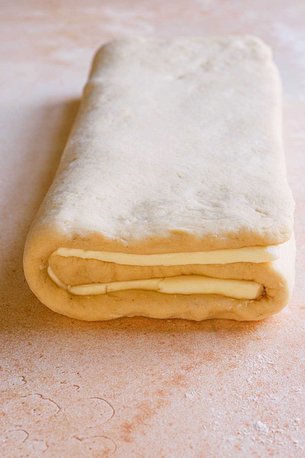 Folded dough lined with butter block.