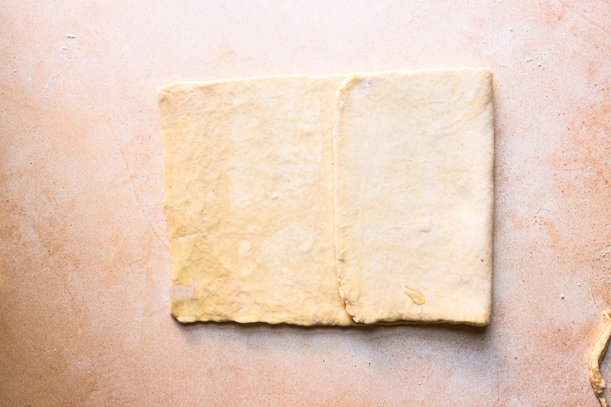 Dough folded in three.