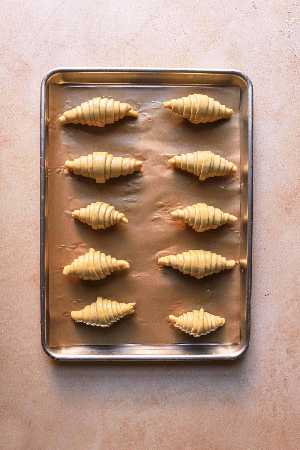 Unbaked crescent shaped pastries, unbaked.