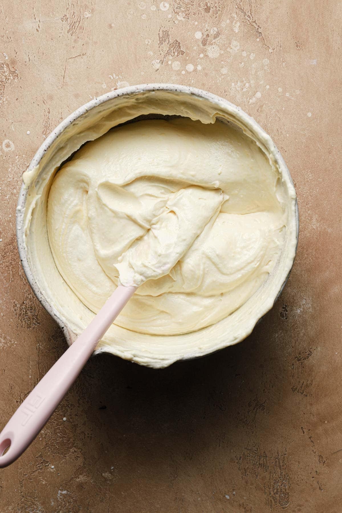 Tiramisu cream in a large bowl.