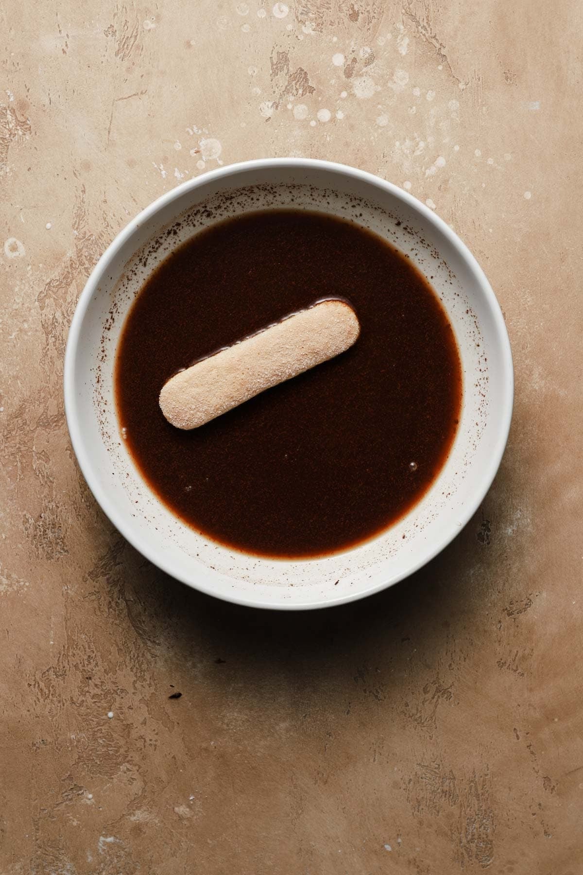 A lady finger dipped in coffee.