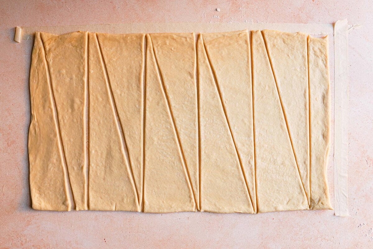 rectangle dough cut into triangles.