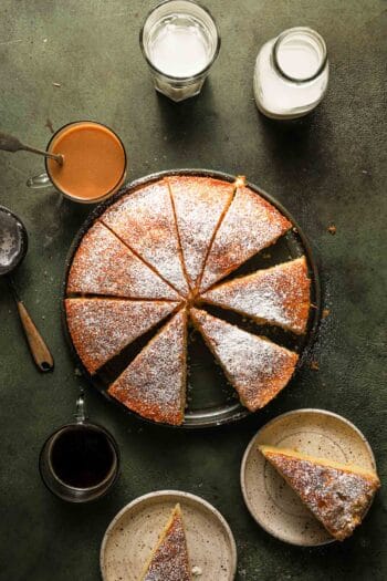 sliced cake topped with powdered sugar