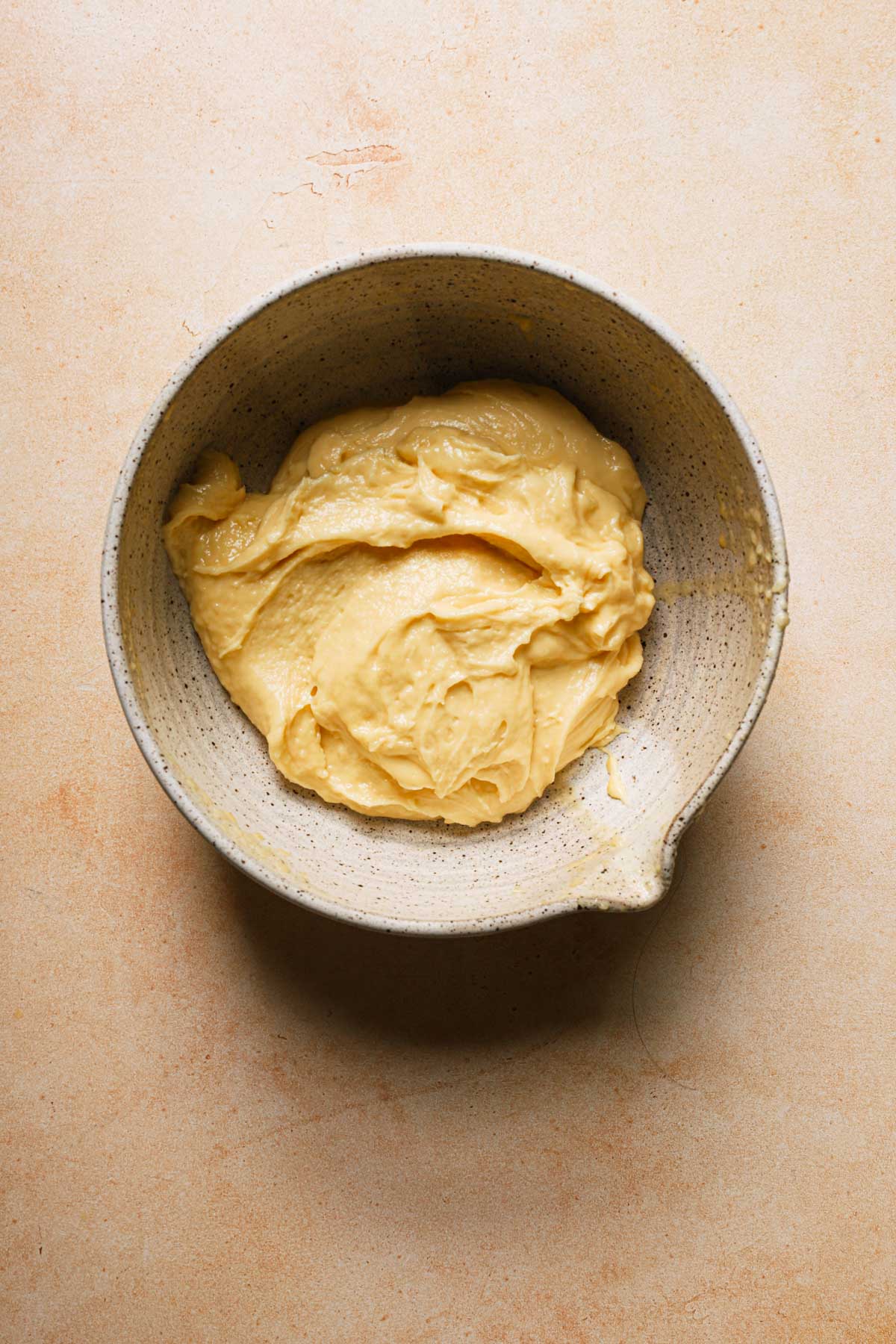 A choux paste in a large bowl.