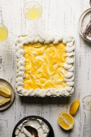 Limoncello dessert with plate and drinks around.