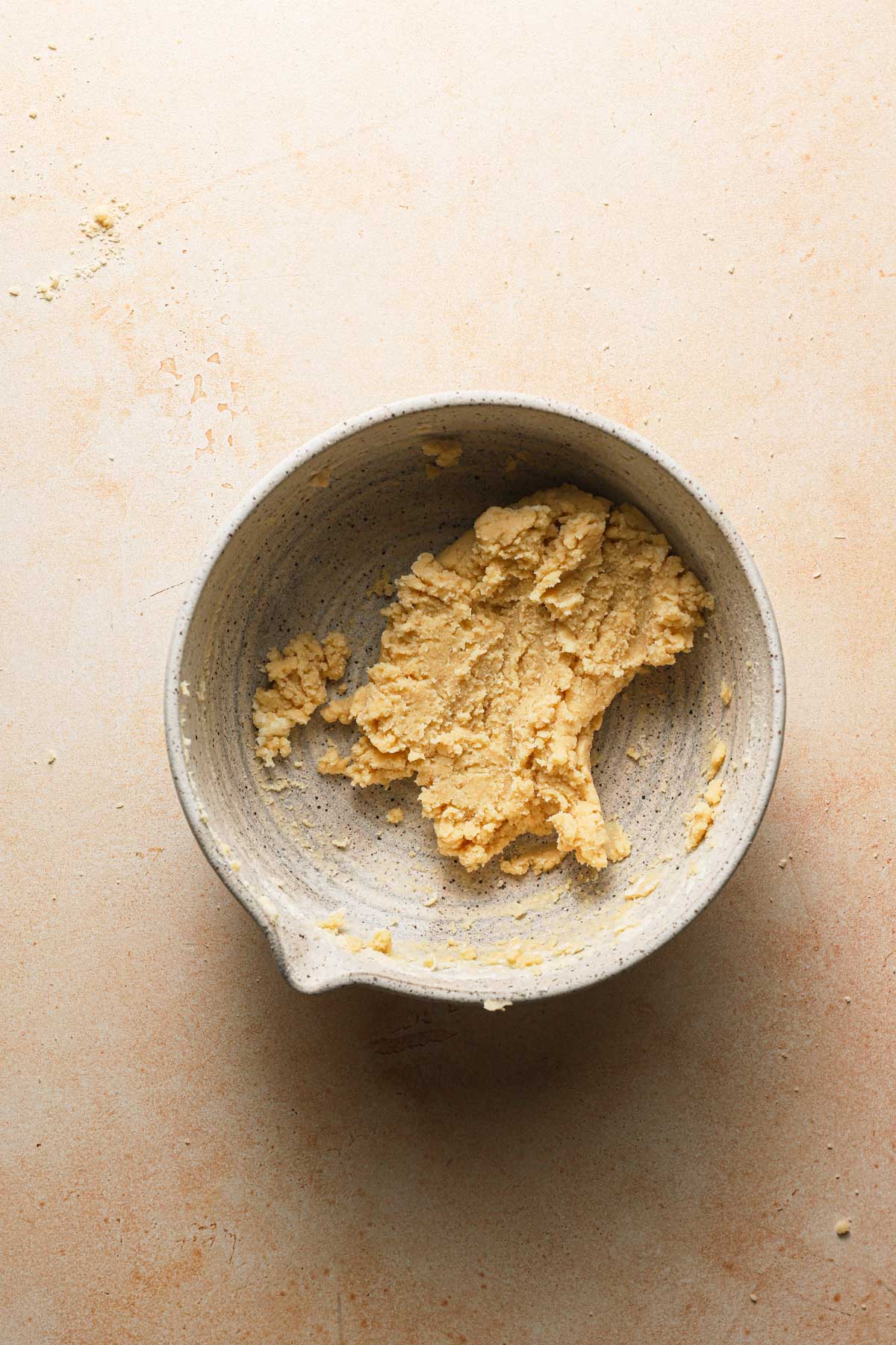 A large bowl with cookie doug.