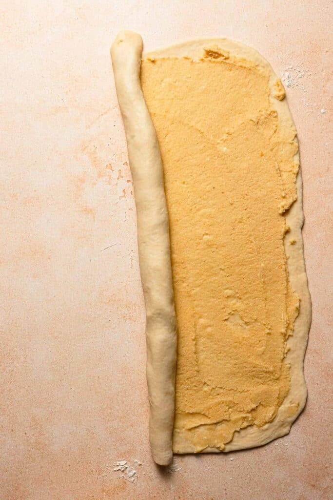 Rolling the dough into a spiral.