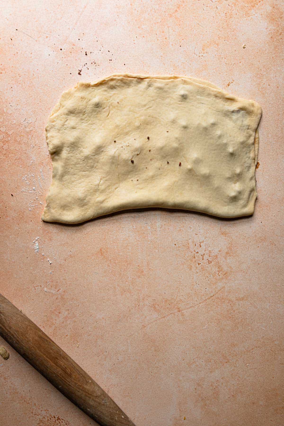 rolled dough with a rolling pin.