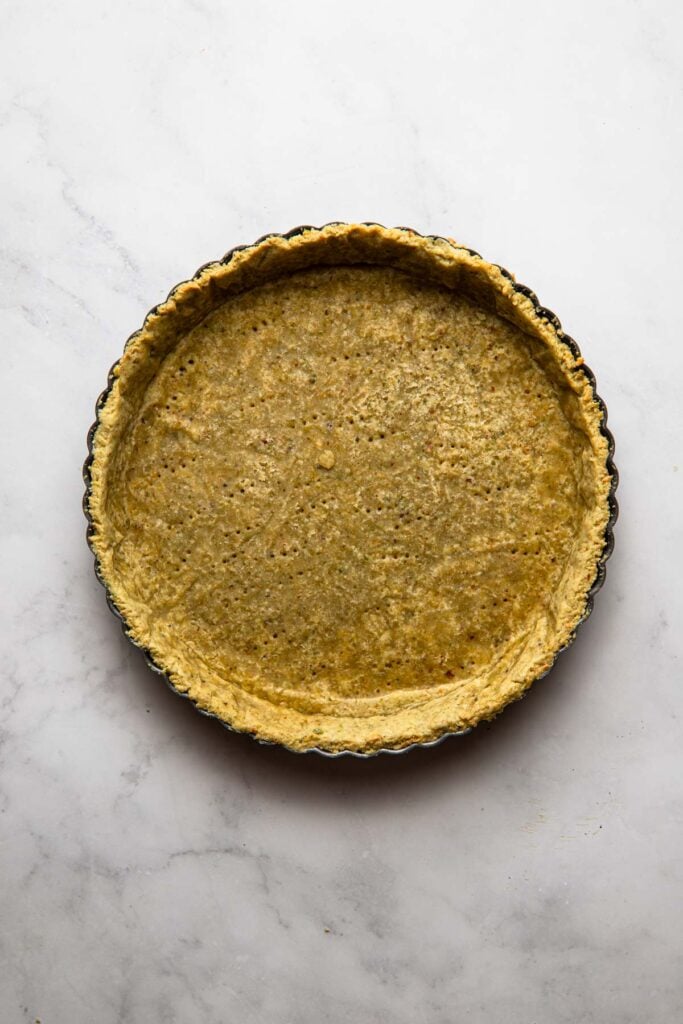 Par-baked pistachio crust.