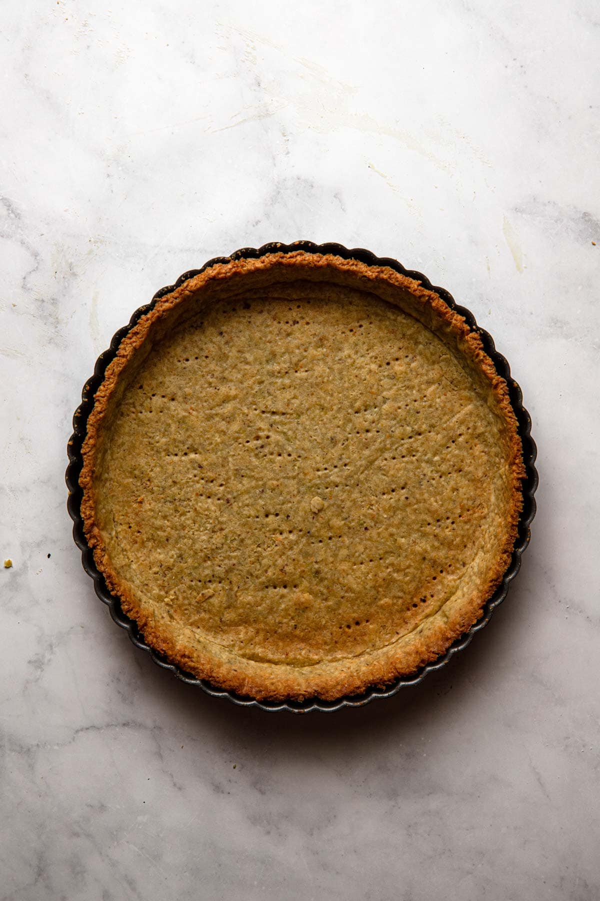 Fully baked pistachio crust.