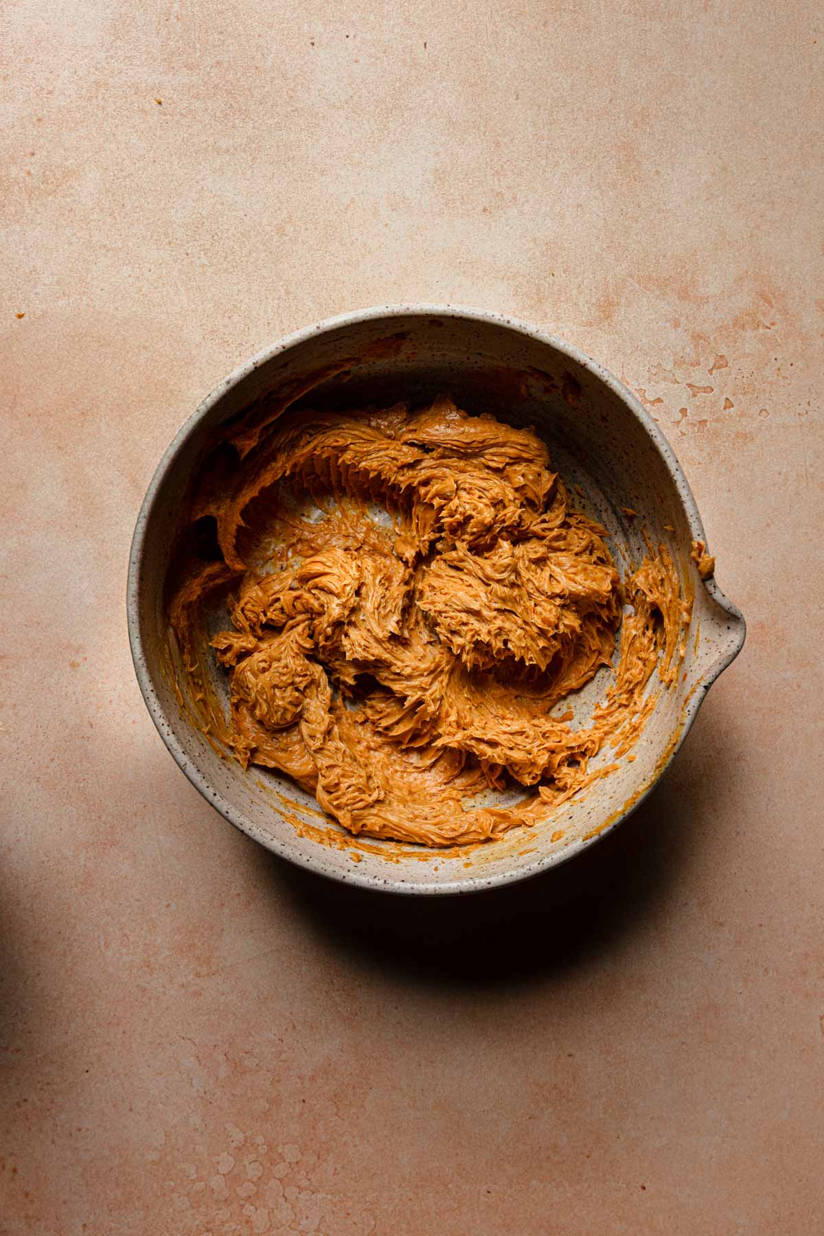 A bowl with pistachio caramel cream.