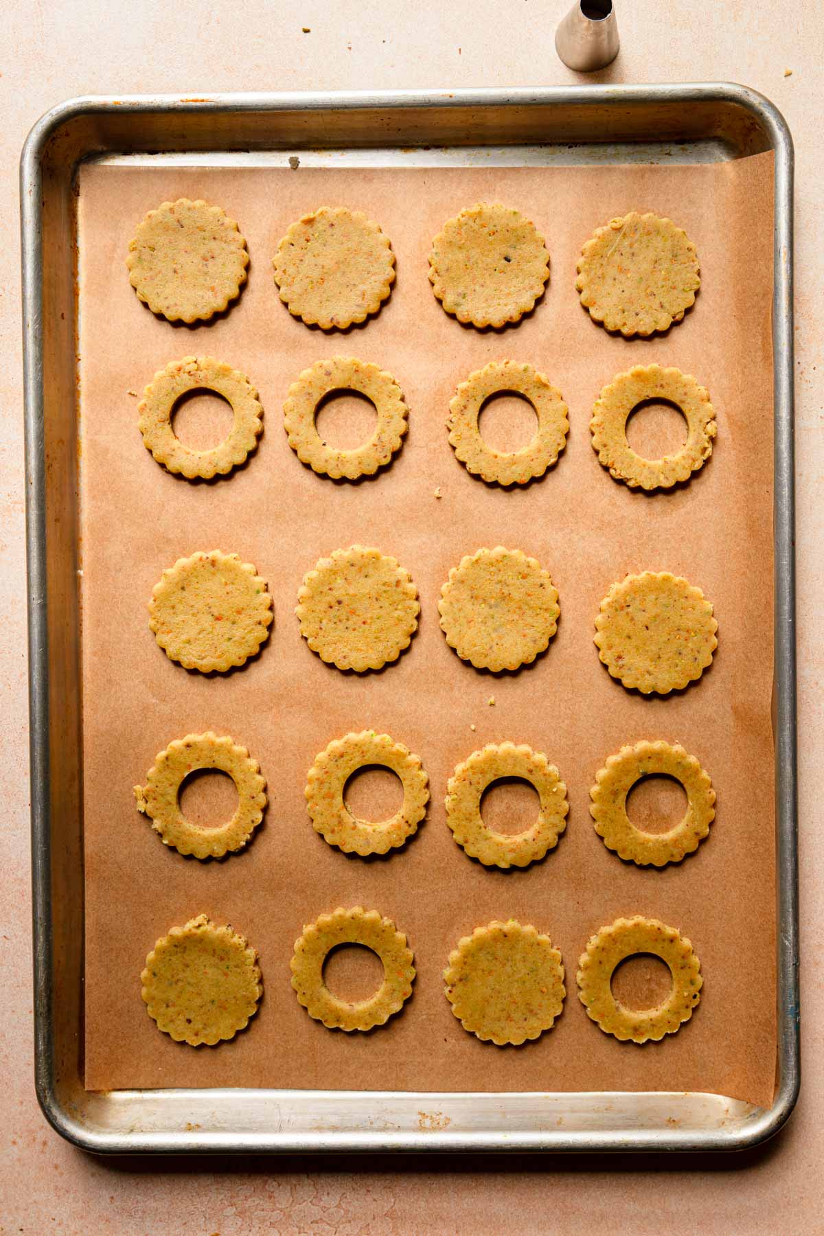 A baking pan with cut cookie dough.